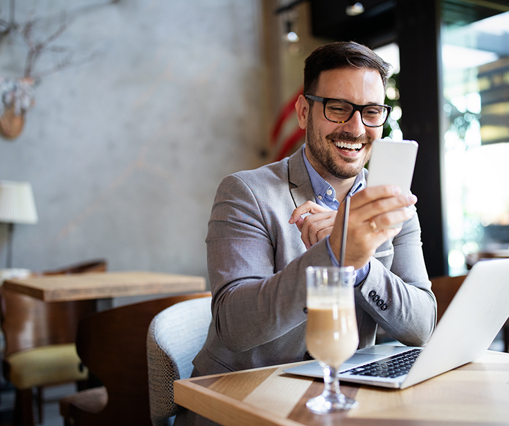 handsome business man receiving a happy message on KCNNNXW